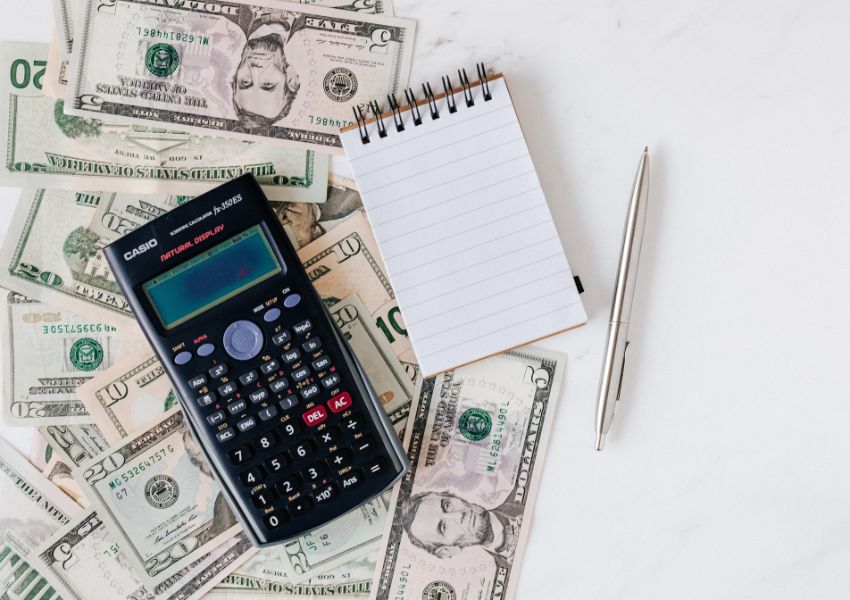a%20calculator%20and%20note%20pad%20on%20top%20of%20a%20bunch%20of%20cash a%20calculator%20and%20note%20pad%20on%20top%20of%20a%20bunch%20of%20cash